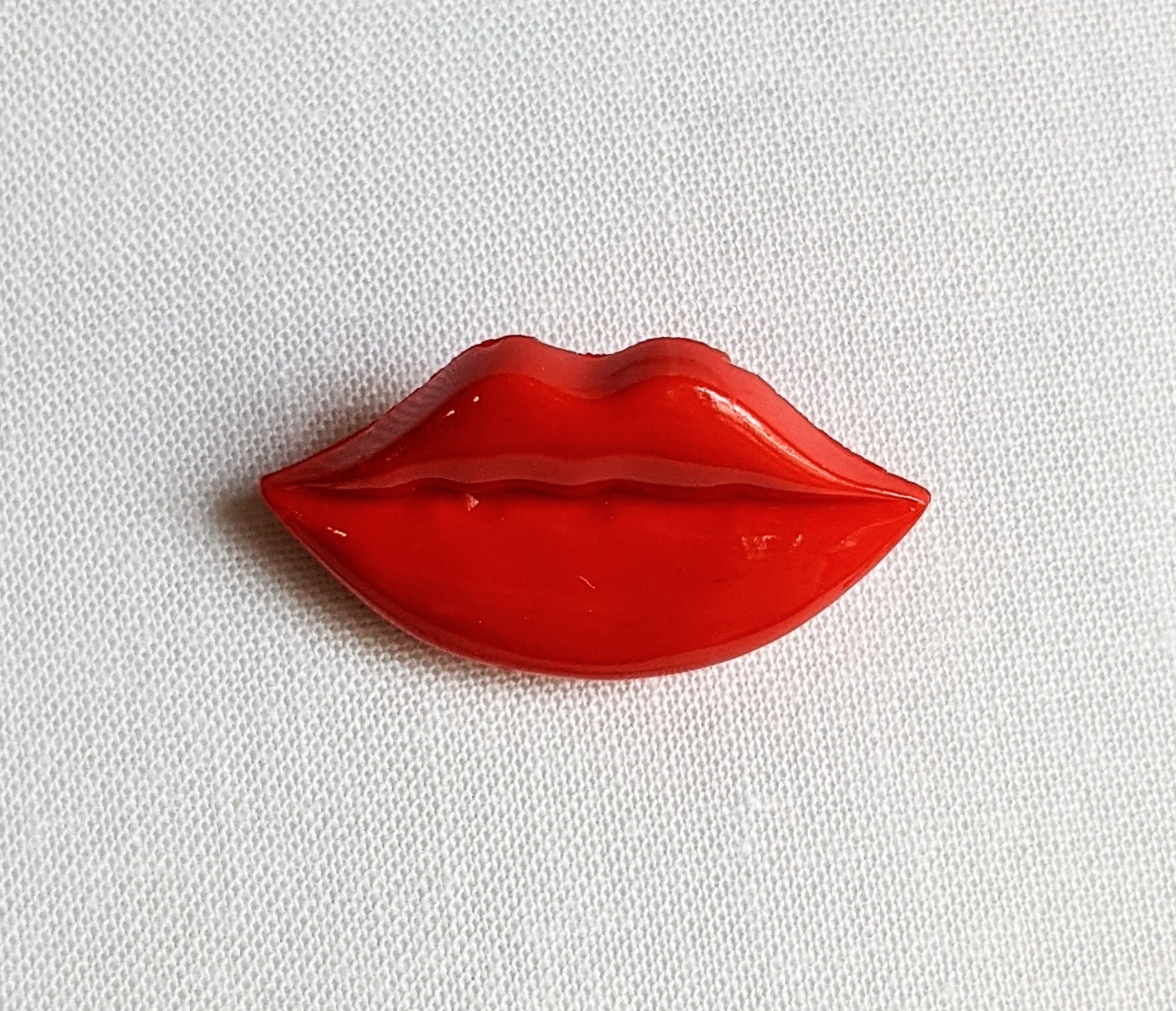 Bouton bouche rouge