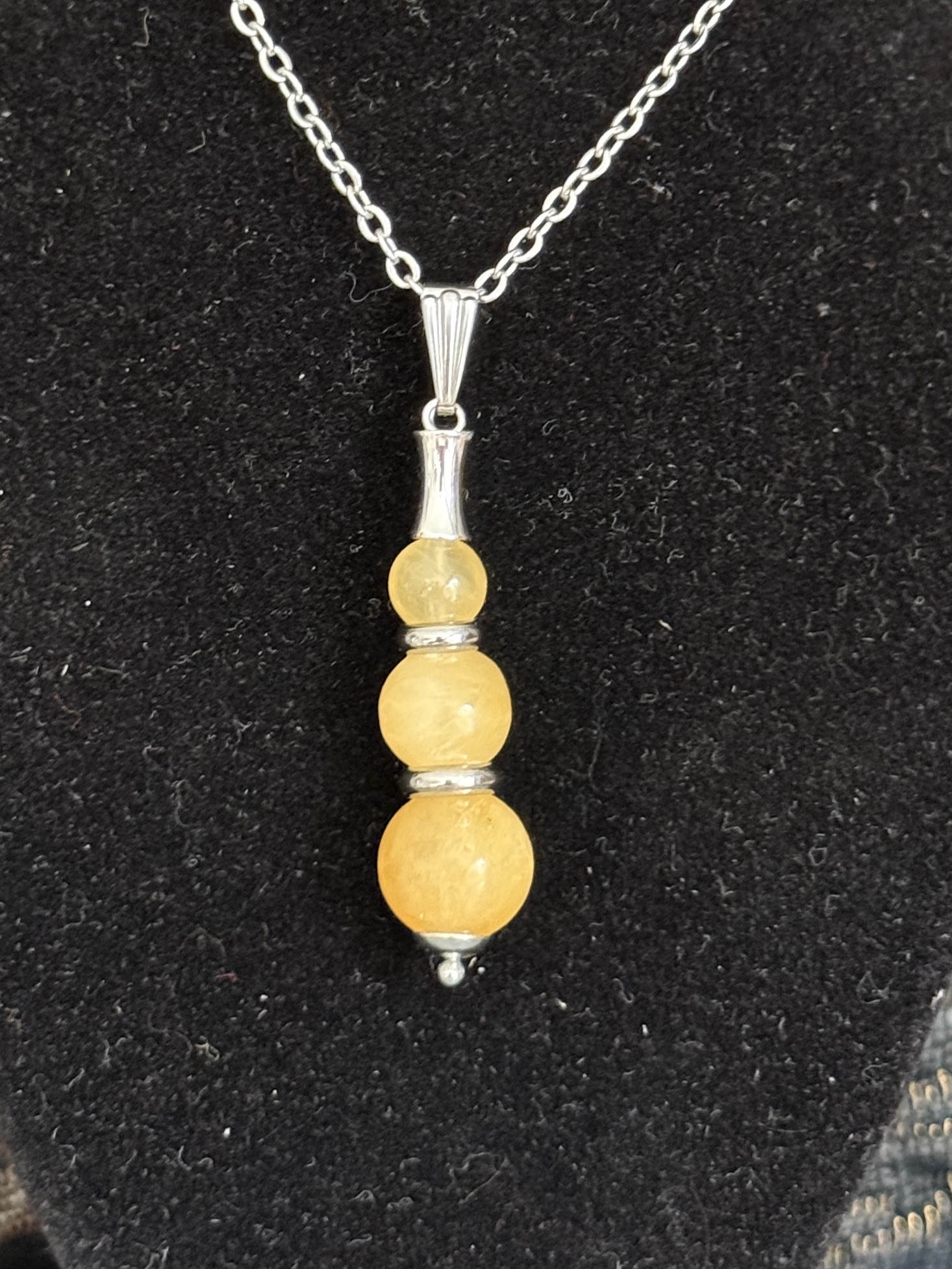 Pendentif "Echo de Gaïa" en Calcite Orange