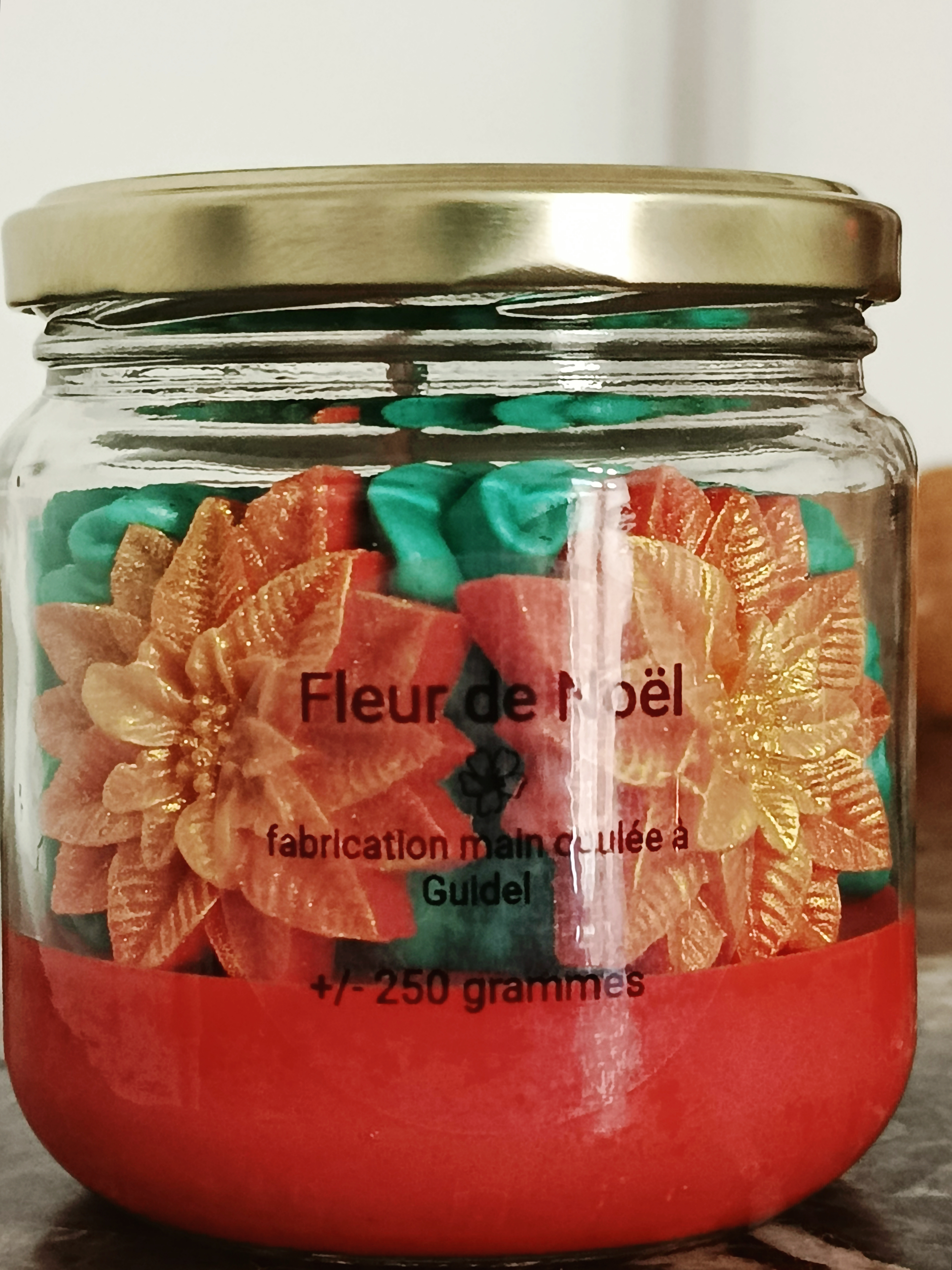 bougie gourmande fleur de Noël 