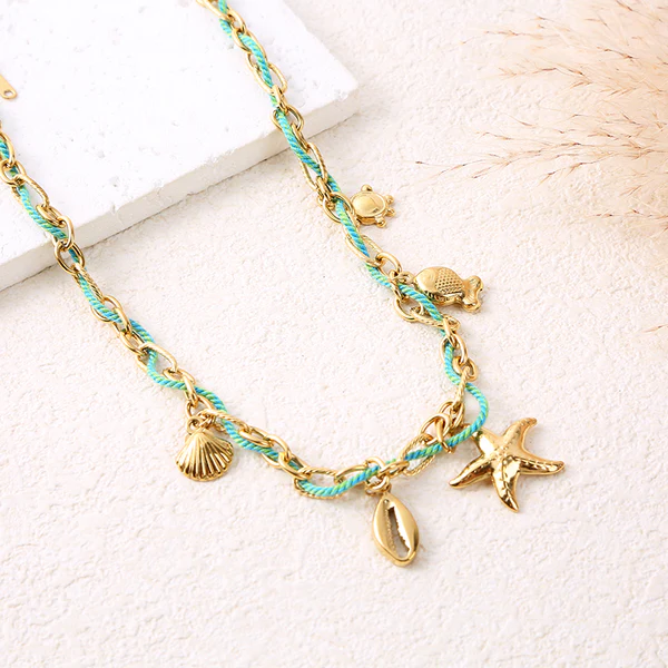 Collier chaîne dorée cordon turquoise marin