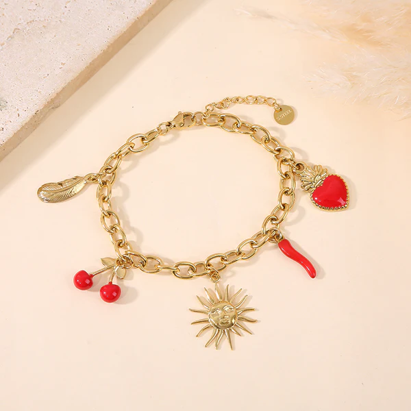 Bracelet doré breloques soleil fleur piment cœur feuille