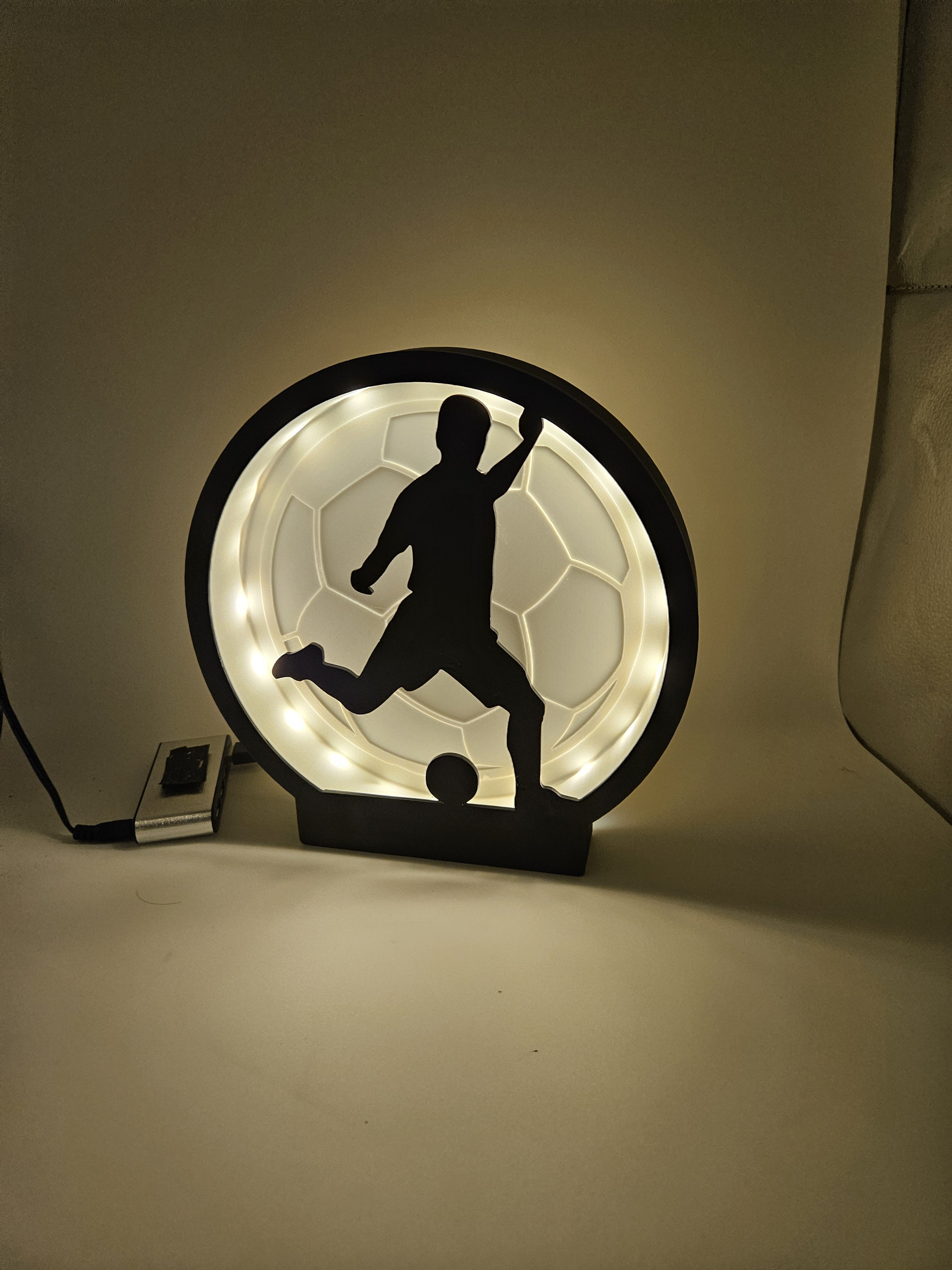 Lampe moderne lumineuse joueur de foot 