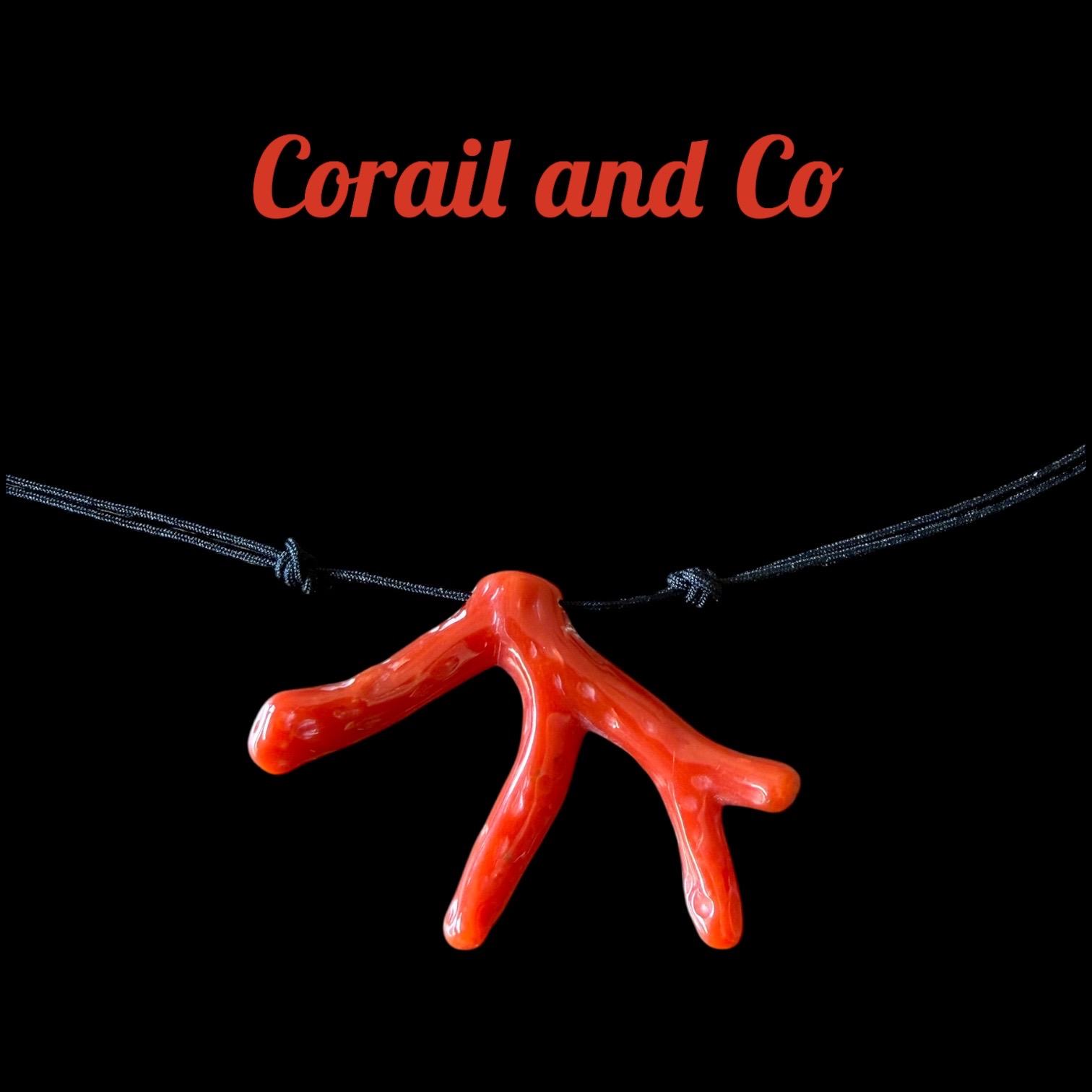 Collier branche de corail sur cordon noir 