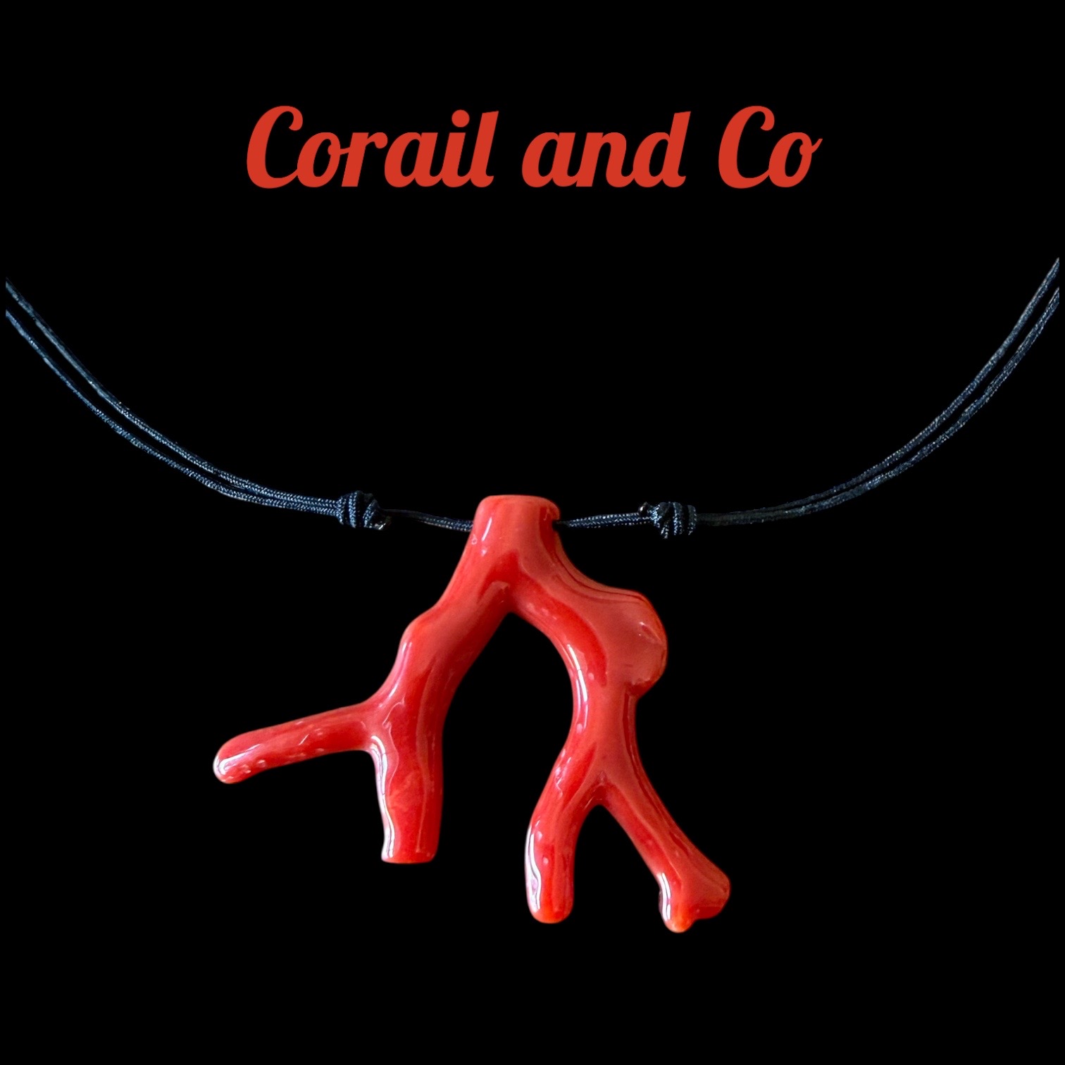 Collier branche de corail sur cordon noir 