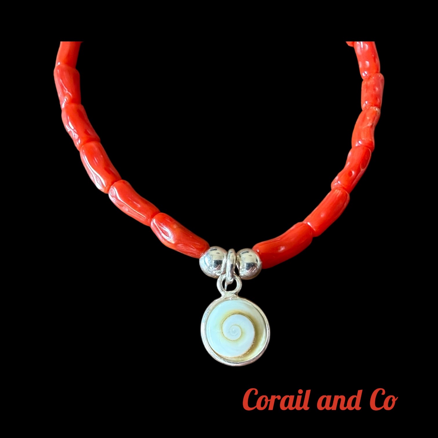 Bracelet femme corail / Oeil Sainte Lucie