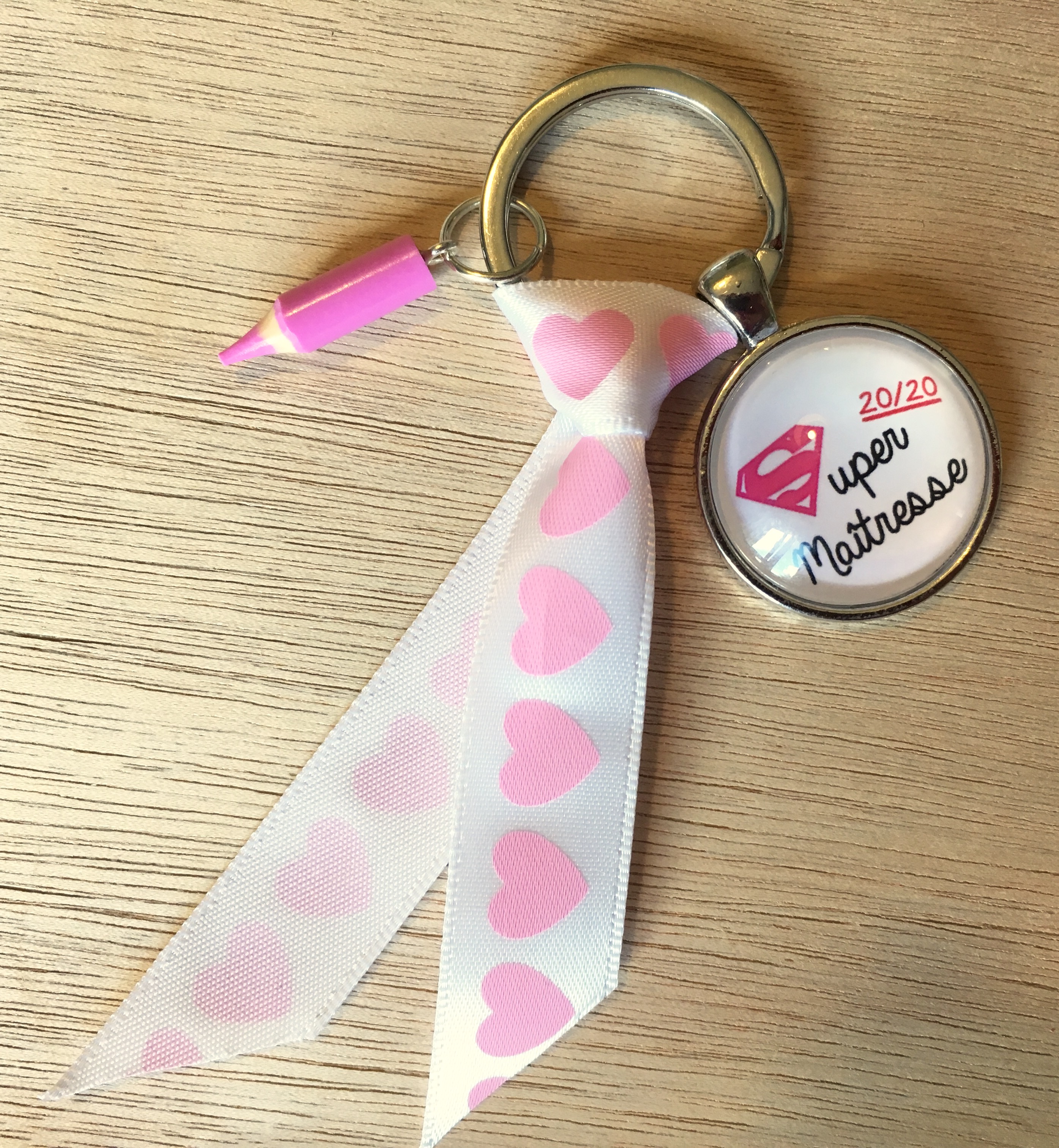 Un Porte clé Super maîtresse rose