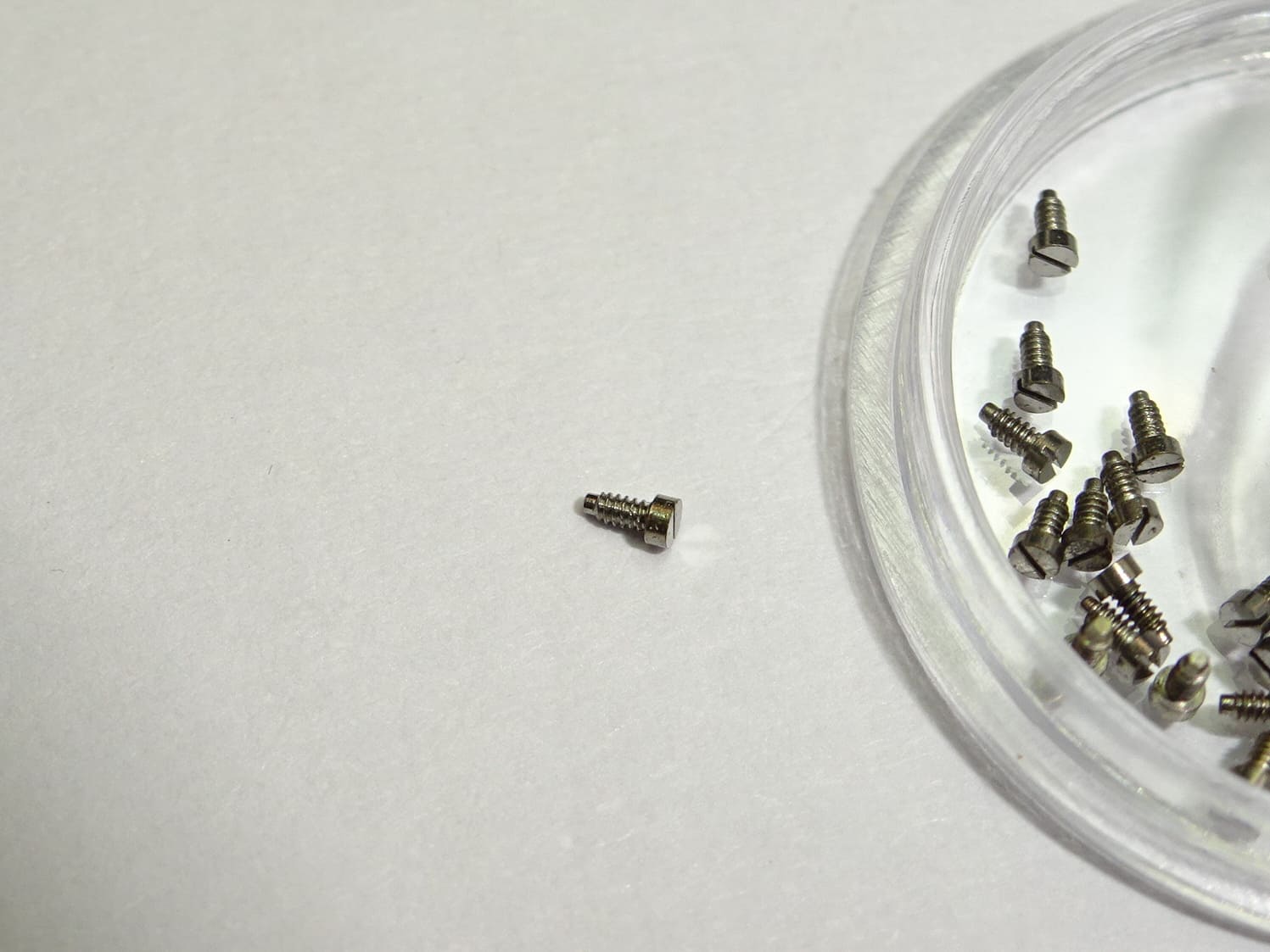 Omega screw 2053 for barrel bridge and other parts caliber 620 (pre-owned)